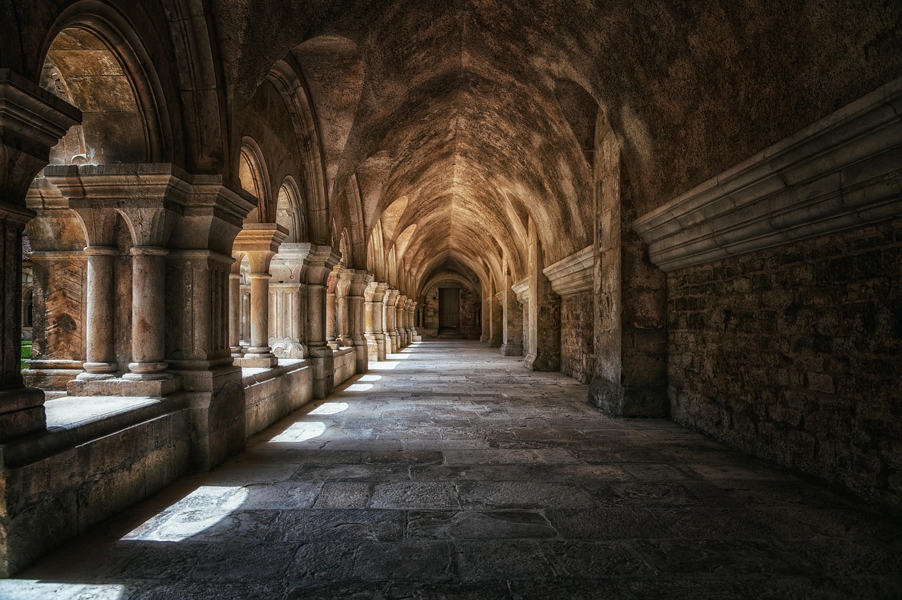 Warm stone vaults and columns in a monastery cloister